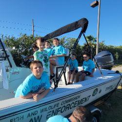 kids in a boat